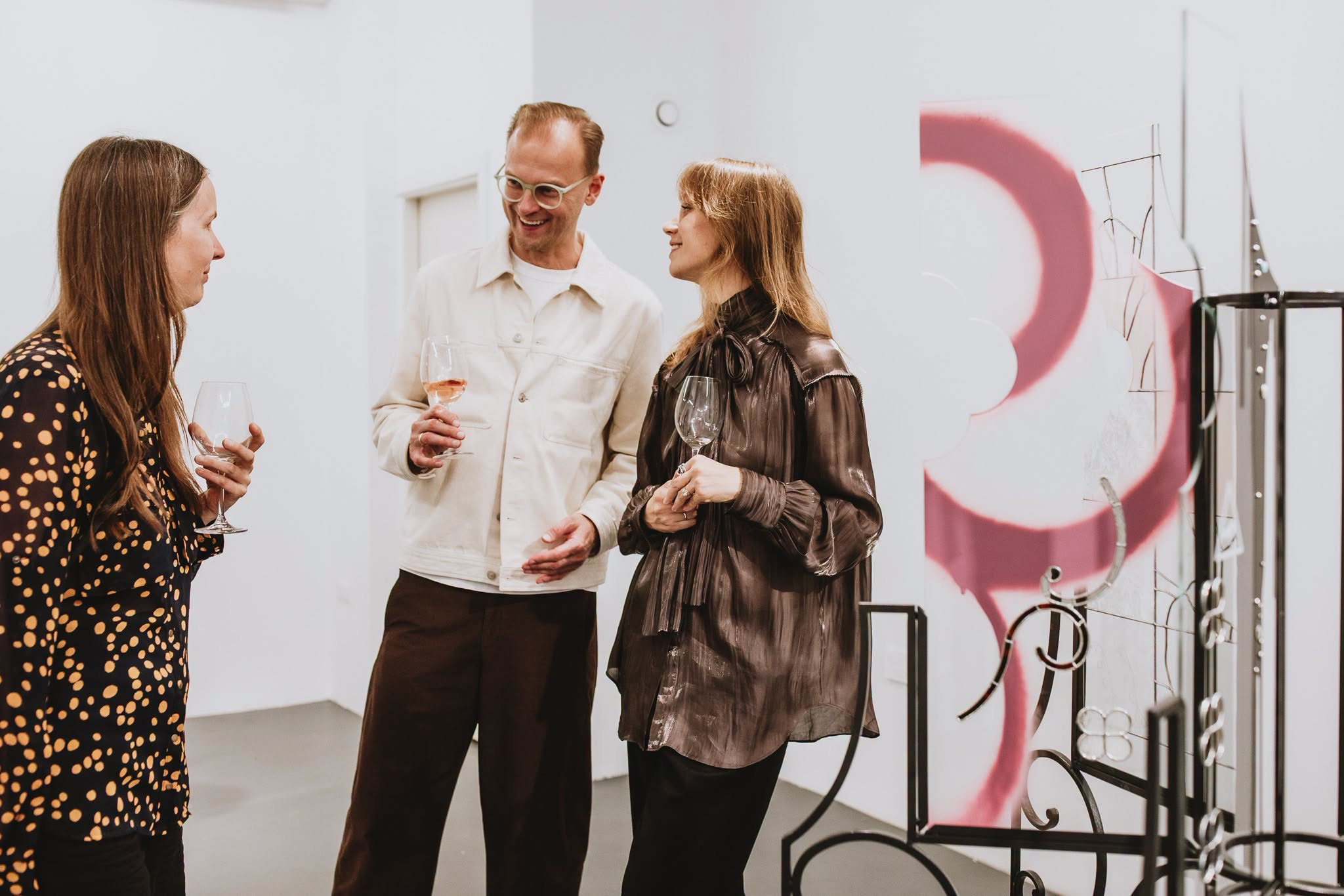 Guests talking at an exhibition event in Kogo Gallery